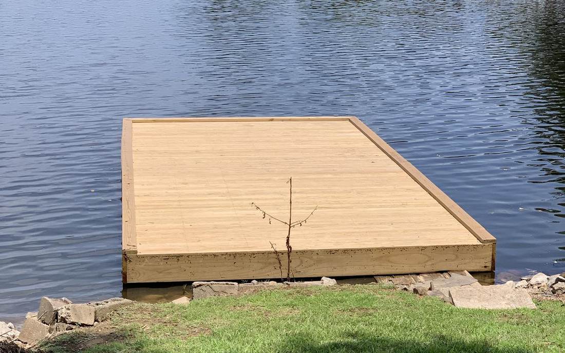 Private dock on a quiet Lake of Egypt cove